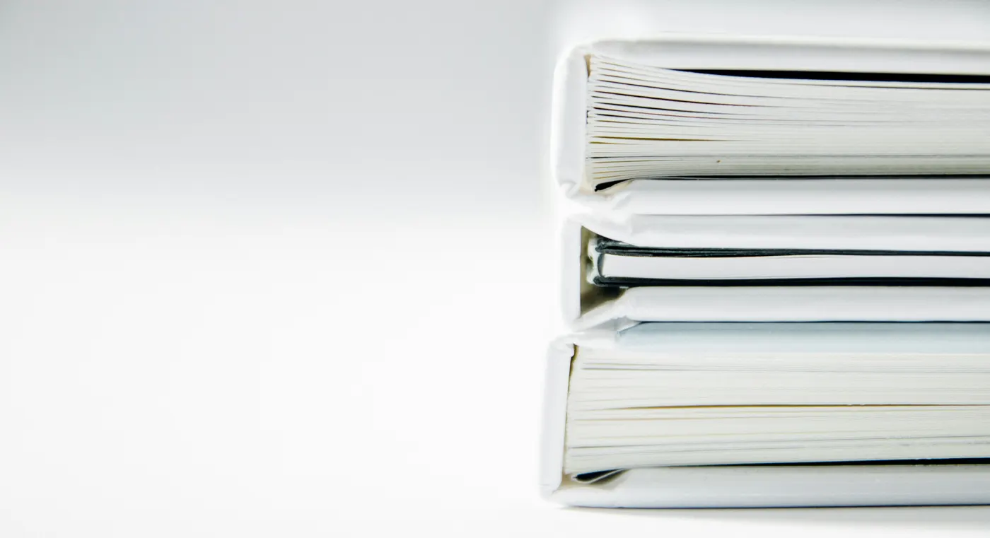 Stacked case files and binders